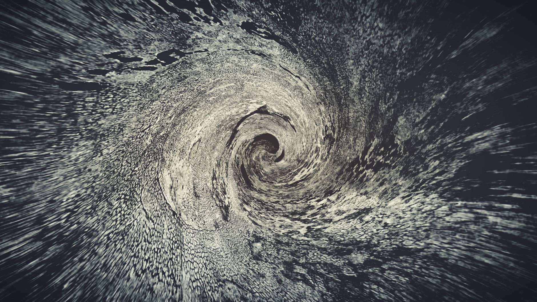 Abstract swirling pattern with dynamic motion effect, suitable for artistic backgrounds.